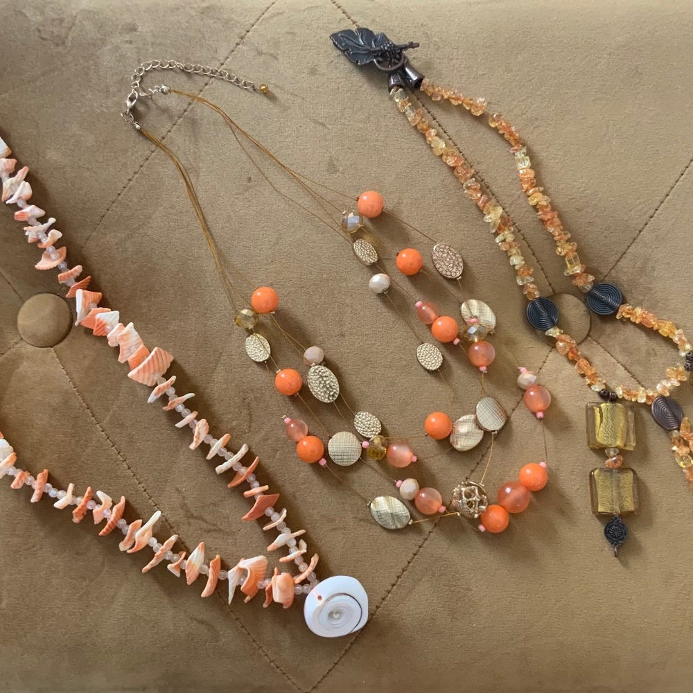 Necklace trio in orange.